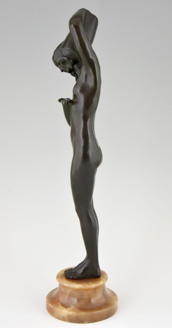 Art Deco bronze sculpture of a nude with jar