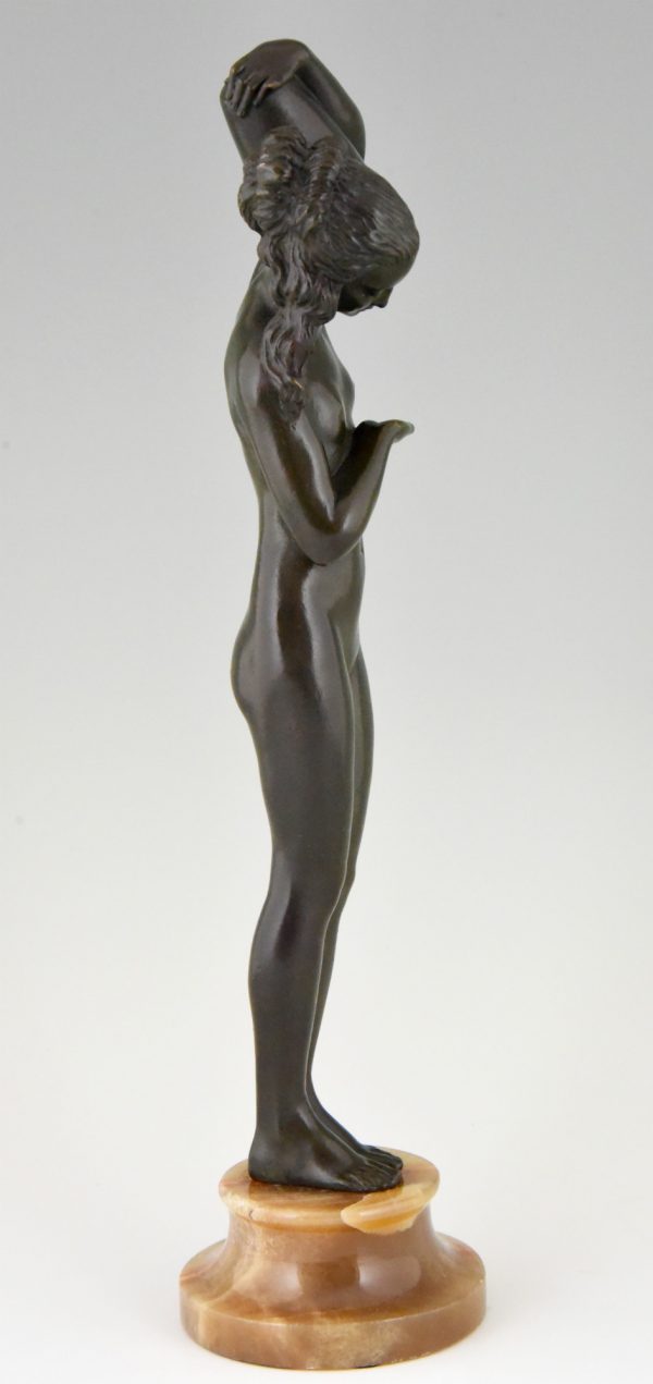 Art Deco bronze sculpture of a nude with jar