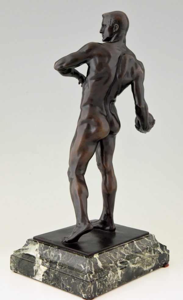 Antique bronze athletic male nude with ball