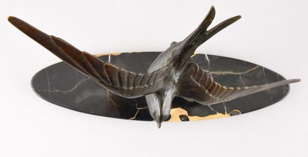 Art Deco bronze sculpture of a swallow bird.