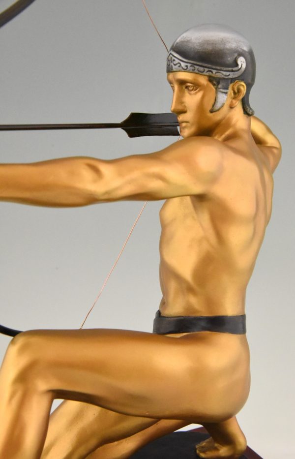 Antique bronze sculpture of a male nude archer.
