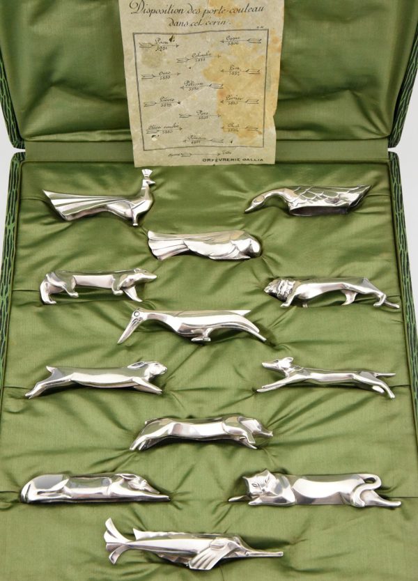 Art Deco set of 12 silvered animal knife rests in case