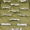 Art Deco set of 12 silvered animal knife rests in case