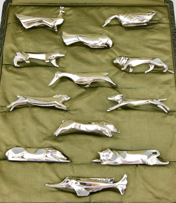 Art Deco set of 12 silvered animal knife rests in case