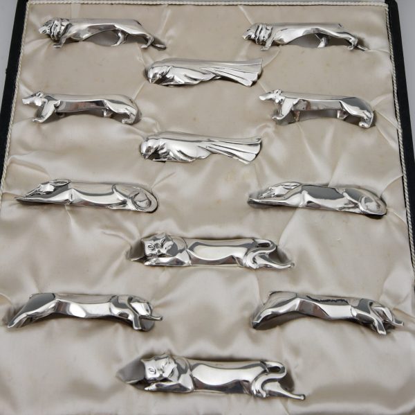 Art Deco set van 12 verzilverde messenleggers dieren in doos