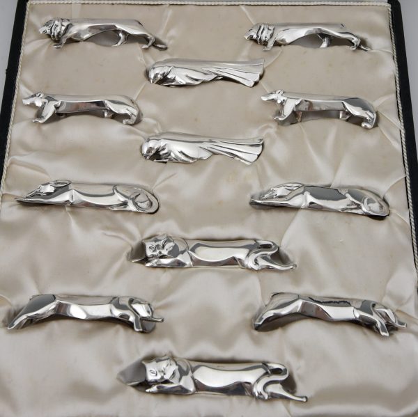 Art Deco set of 12 silvered animal knife rests in case