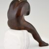 Sculpture en bronze homme assis sur socle en marbre