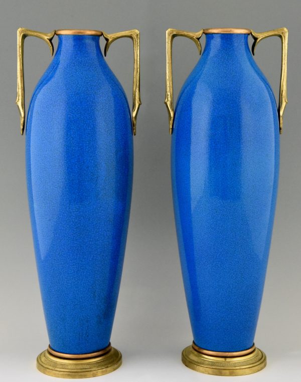 Pair of Art Deco ceramic and bronze vases with blue crackle glaze