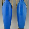 Une paire de vases Art Deco en ceramique blue et bronze