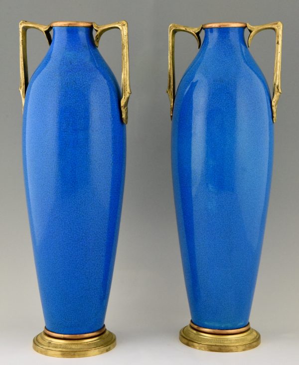 Pair of Art Deco ceramic and bronze vases with blue crackle glaze