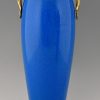 Une paire de vases Art Deco en ceramique blue et bronze