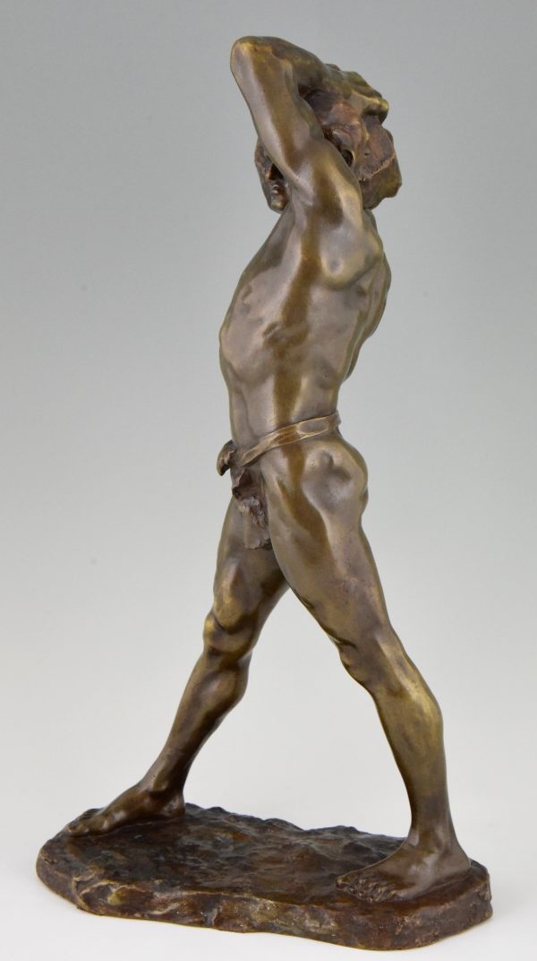 Bronze Skulptur Starker Mann mit Stein