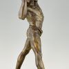Sculpture en bronze homme fort à la pierre