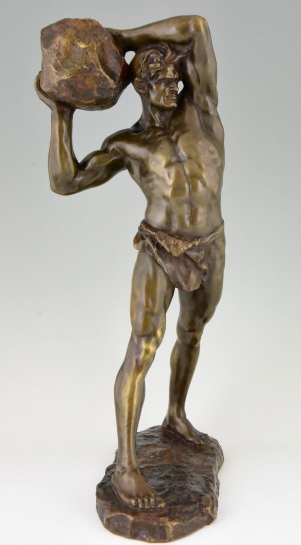 Bronze Skulptur Starker Mann mit Stein