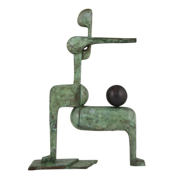 Modern bronze sculpture figure with ball.
