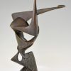 Modern bronze sculpture of a balancing woman