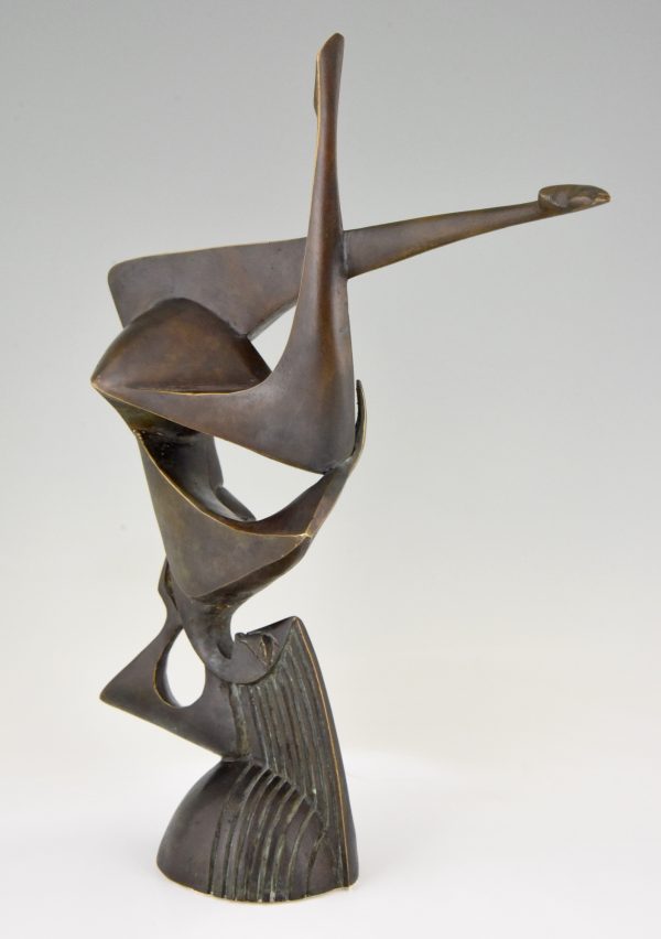 Modern bronze sculpture of a balancing woman