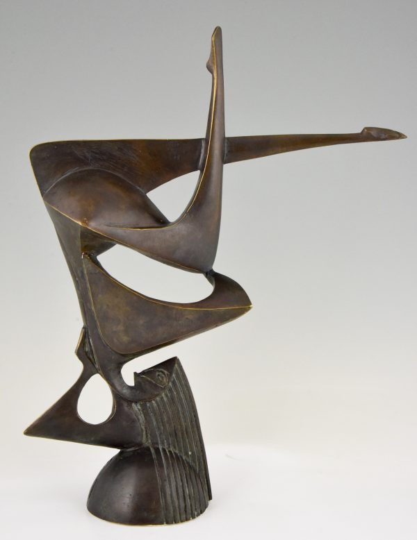 Modern bronze sculpture of a balancing woman