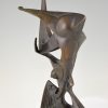 Modern bronze sculpture of a balancing woman