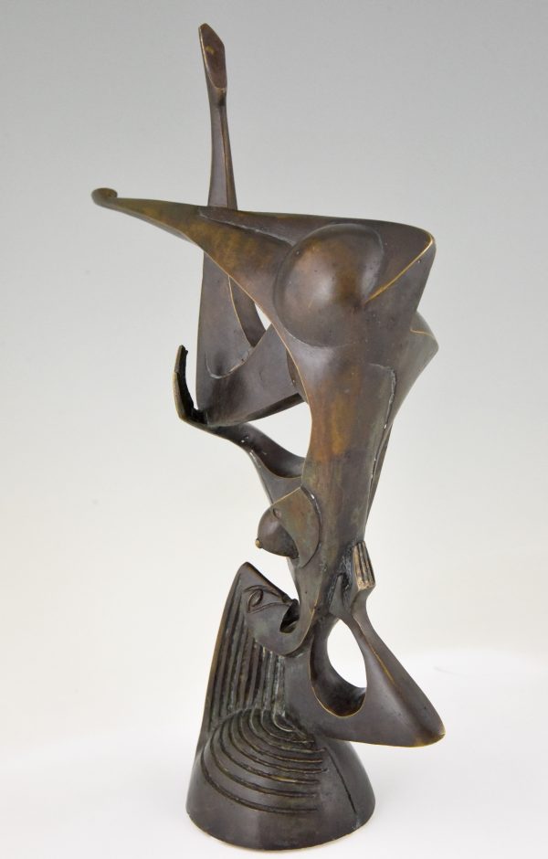 Modern bronze sculpture of a balancing woman