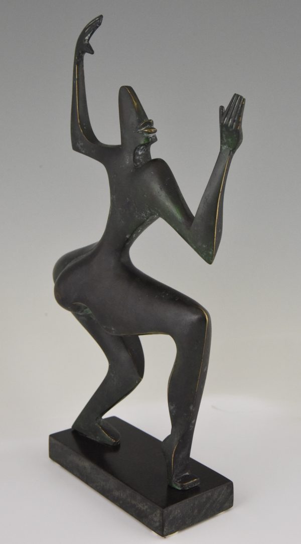 Modern bronze sculpture of a dancer