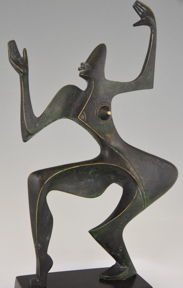 Modern bronze sculpture of a dancer