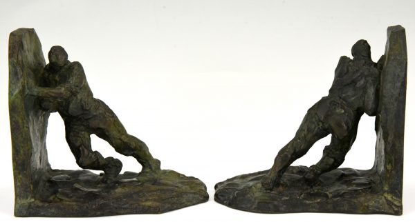 Art Deco bronze bookends two men pushing