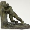 Art Deco bronzen boekensteunen twee duwende mannen