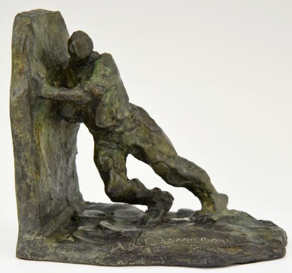 Art Deco bronzen boekensteunen twee duwende mannen