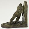 Art Deco bronzen boekensteunen twee duwende mannen