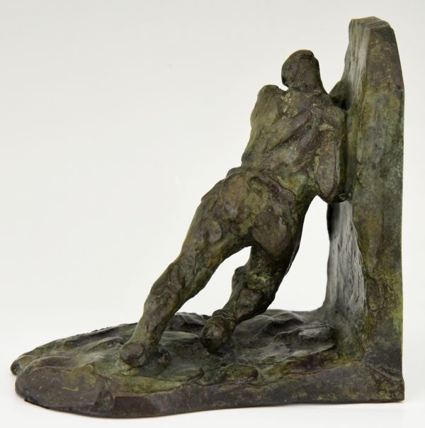 Art Deco bronzen boekensteunen twee duwende mannen