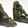 Art Deco bronzen boekensteunen twee duwende mannen