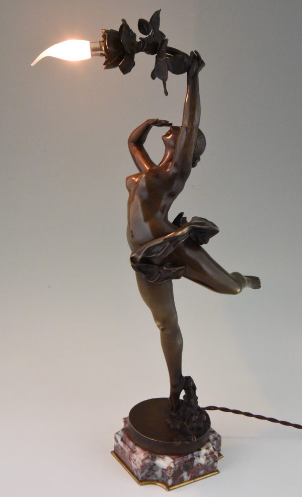 Art Nouveau bronze lamp nude with roses.