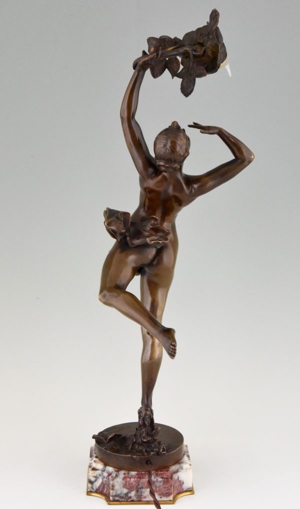 Lampe Art Nouveau en bronze femme nue à la rose