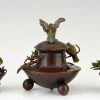 Antique bronze inkwell and vases with birds