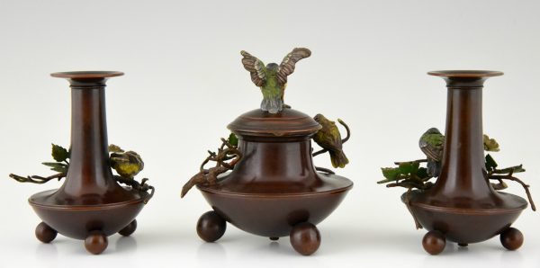 Antique bronze inkwell and vases with birds