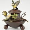 Antique bronze inkwell and vases with birds