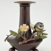 Antique bronze inkwell and vases with birds