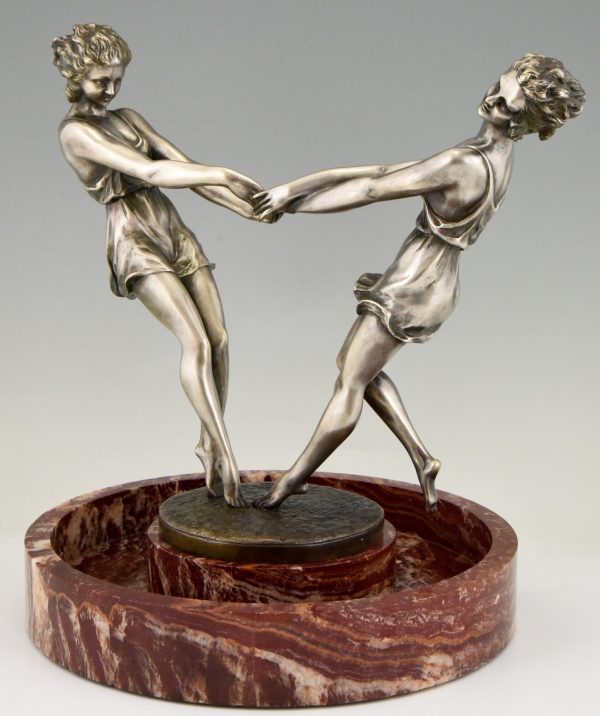 Art Deco centerpiece with bronze sculpture of dancing girls