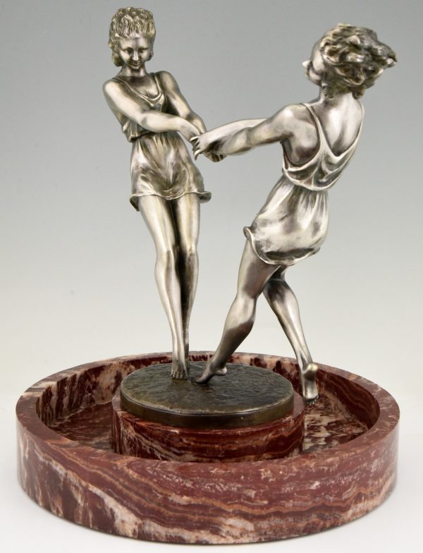 Art Deco centerpiece with bronze sculpture of dancing girls