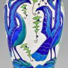 Art Deco ceramic vase with stylized birds.