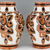 Pair Art Deco ceramic craquelé vases with flowers