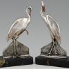 Art Deco bronzen boekensteunen met ooievaars