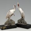 Art Deco bronzen boekensteunen met ooievaars