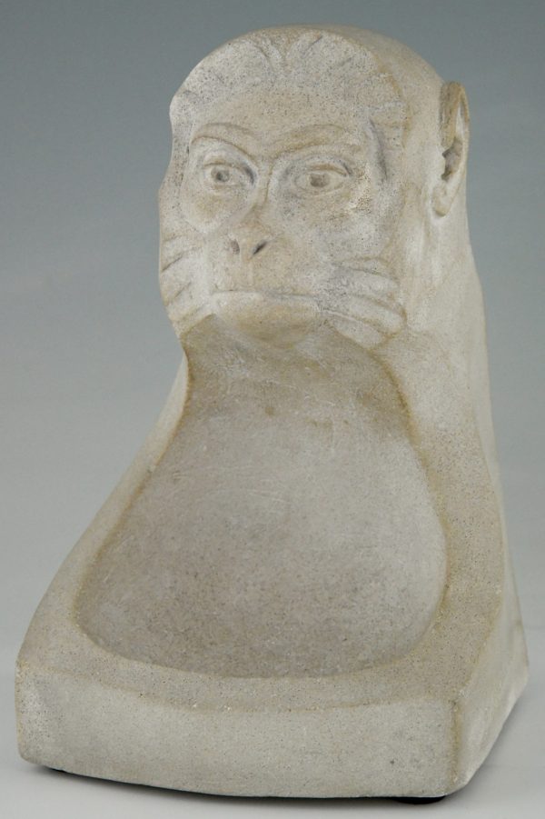 Art Deco stone sculpture with monkey