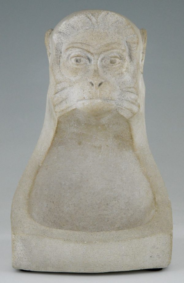 Art Deco stone sculpture with monkey