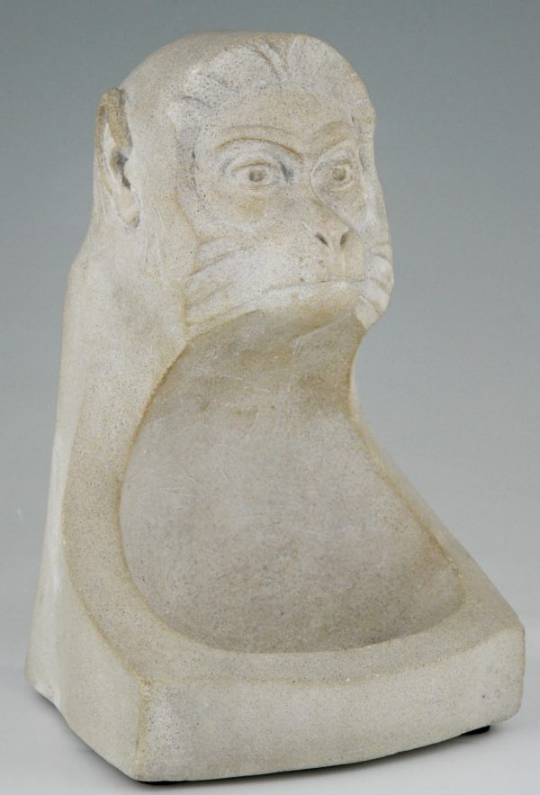 Art Deco stone sculpture with monkey