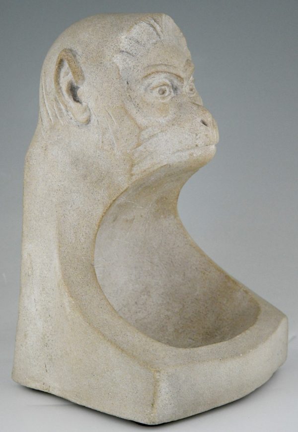 Art Deco stone sculpture with monkey