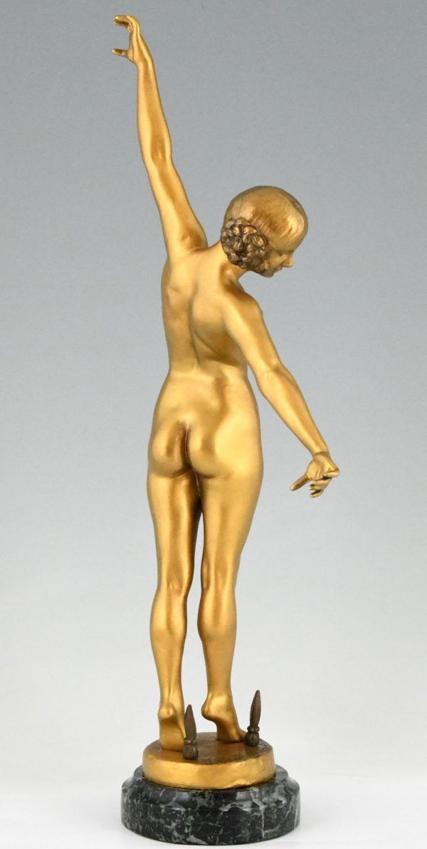 Art Deco bronze sculpture of a nude sword dancer