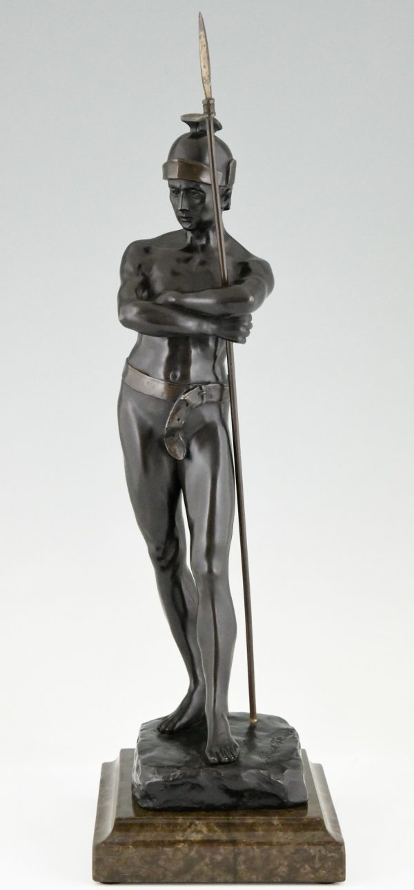 Antique bronze sculpture of a standing Roman warrior
